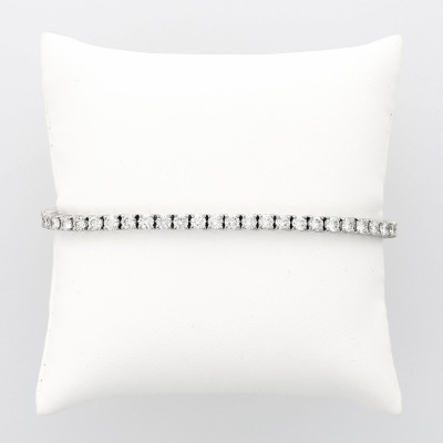 Bracelet rivière de diamants serti 4 griffes caratage total 7,28 carats-or 18 carats