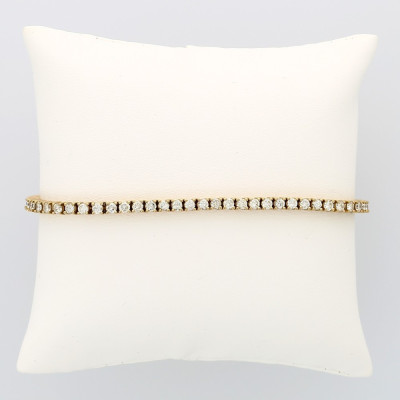 Bracelet rivière femme pavé de 63 diamants (5,05 carats) fermeture cliquet en or 18 carats