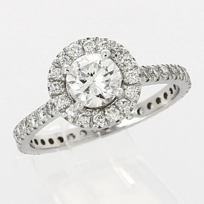 Bague diamant entourage pavé centre serti sur griffes et corps en mini-griffes diamants 1,40 carat - or 18 carats