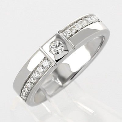 Bague or et diamants Victoire. Ruban contemporain avec diamant central et sur le corps - or 18 carats