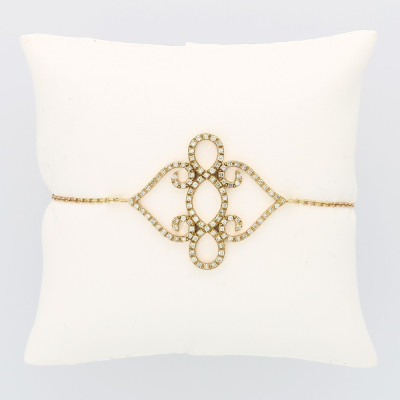 Bracelet motif volute pavé serti mini griffes diamants 1,06 carat-or 18 carats