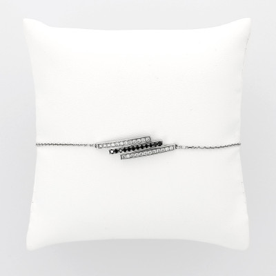 Bracelet barrettes en or 18 carats , diamants blancs et diamants noirs pour un poids total de 0,43 carat