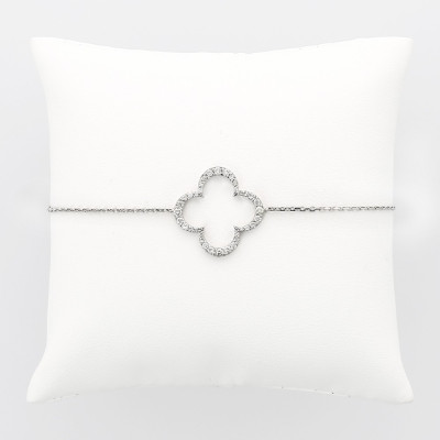 Bracelet porte bonheur trèfle à 4 feuilles. 0,41 carat de diamants en serti mini-griffes, en or 18 carat