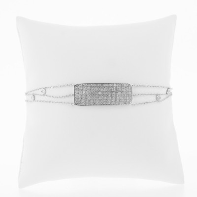 Bracelet plaque pavée de diamants accompagné de 3 chaînes avec 4 diamants sertis clos en or 18 carats