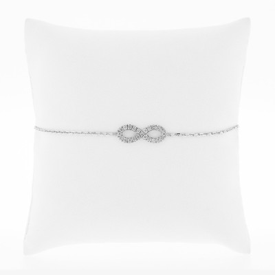 Bracelet au motif signe infini pavé de diamants sertis mini-griffes en or 18 carats 