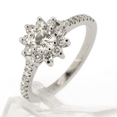 Bague or et diamants Bloom. Modèle marguerite , diamant central de 0,41 ct - or 18 carats