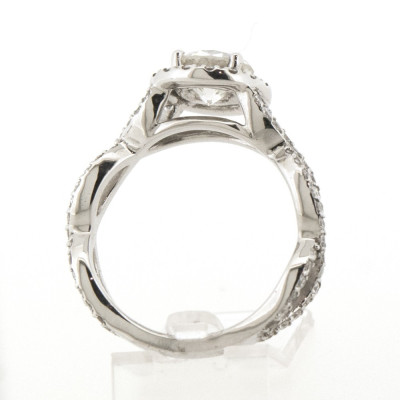 Solitaire or et diamants Caroline. Torsade avec au centre un diamant rond et entourage diamants - or 18 carats