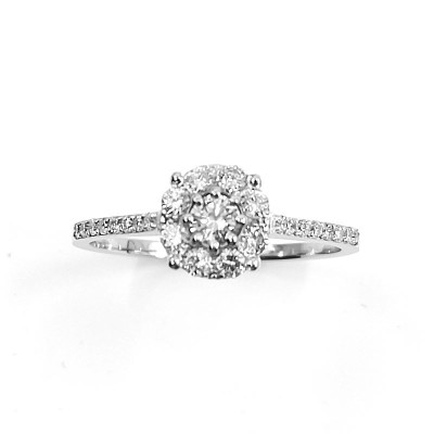 Solitaire illusion Domina. modèle réhaussé avec un diamant central de 0,10 ct - or 18 carats.