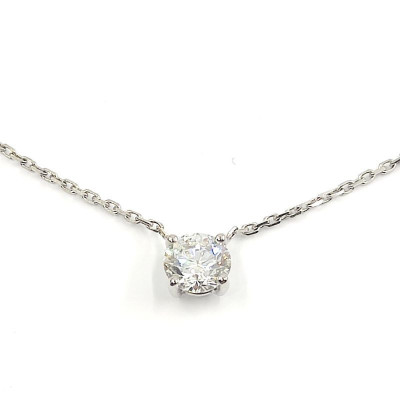 Collier avec un diamant solitaire de 0,90 ct. Monture extra plate. Chaine maille forçat diamantée - or 18 carats