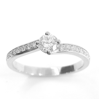 Solitaire or et diamants Tourbillon. Chaton torsadé avec un diamant de 0,28 ct et corps serti de diamants - or 18 carats