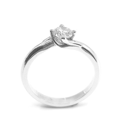 Solitaire or et diamant tourbillon, 1 diamant de 0,29 ct  serti sur chaton 4 griffes - or 18 carats