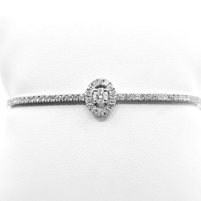 Bracelet diamants galbé pavé finition chaine. Diamant central de 0,20 ct avec entourage ovale diamants - or 18 carats